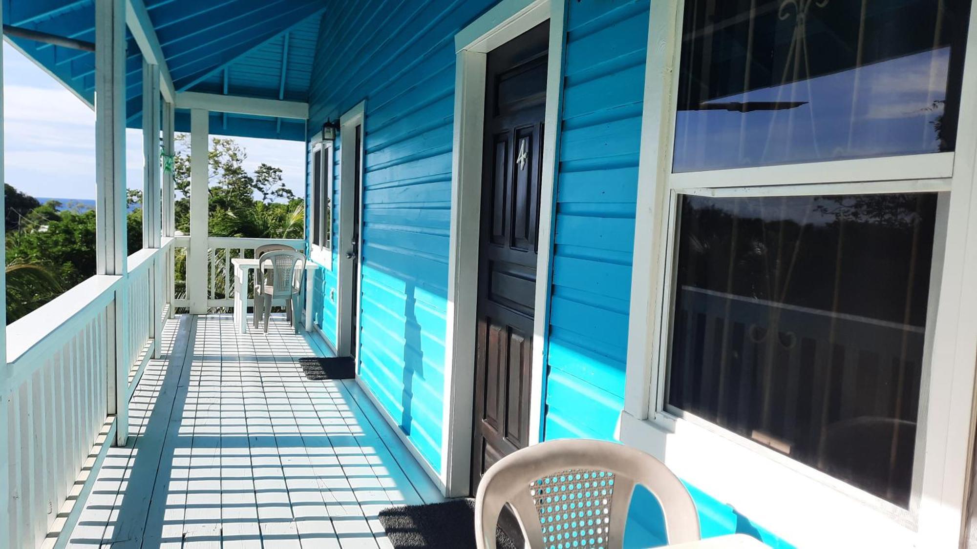Guava Grove Resort & Villas Sandy Bay Kamer foto